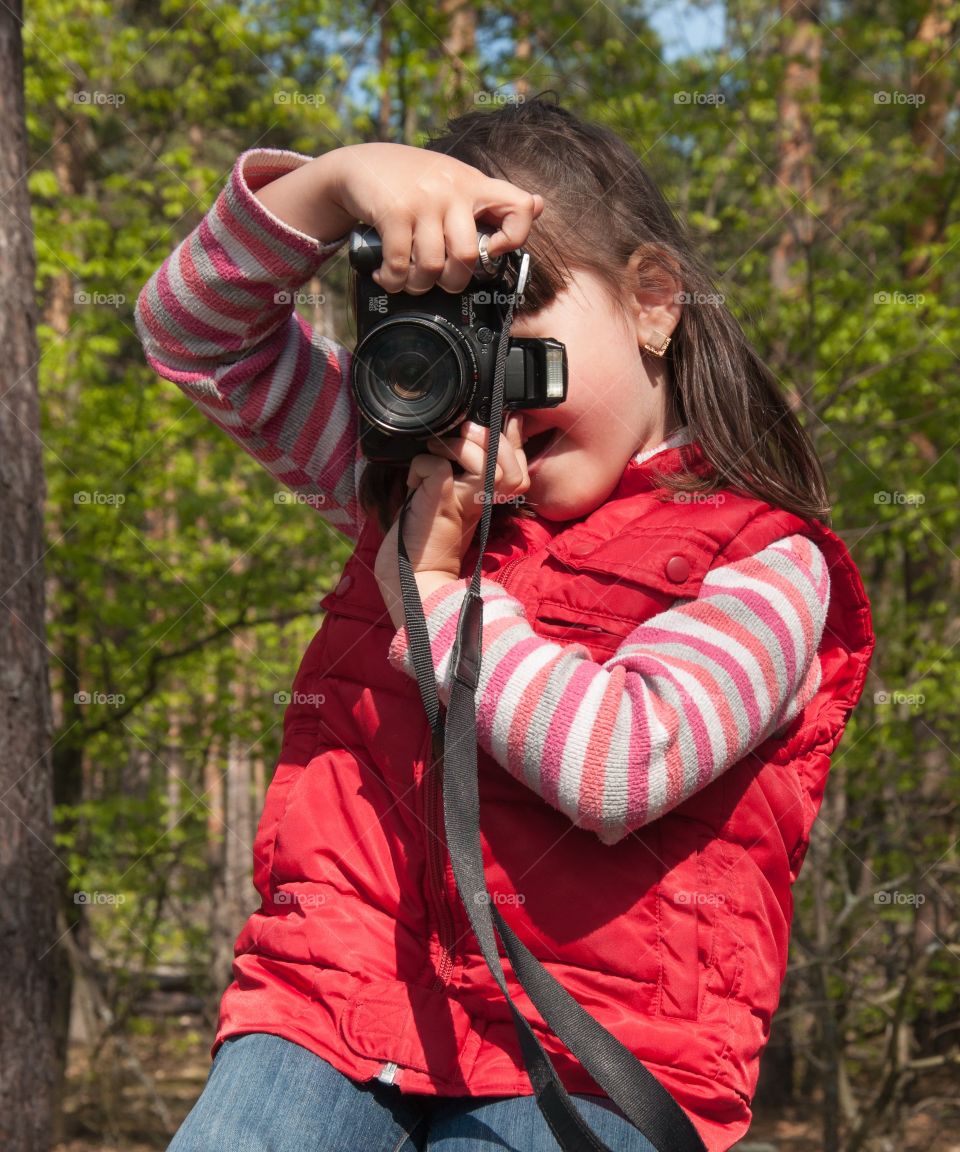 Girl with photo camera