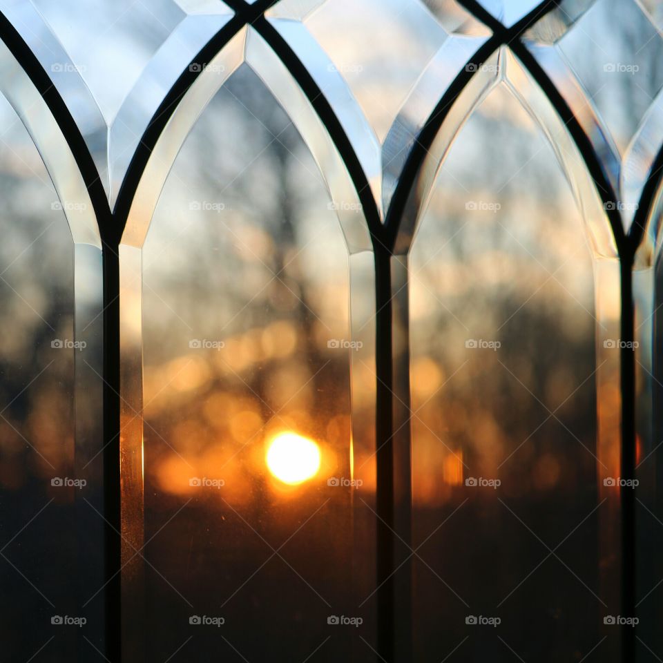 sunrise through leaded glass