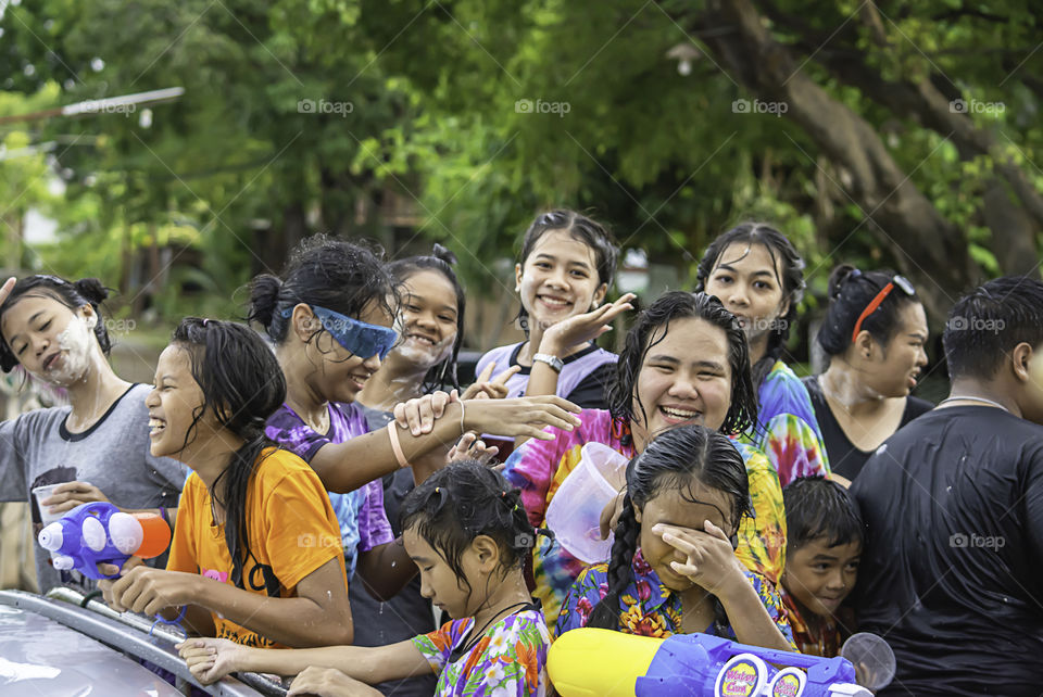 Tourists on the car play water in Songkran festival or Thai new year at Bang kruai, Nonthaburi , April 15, 2019