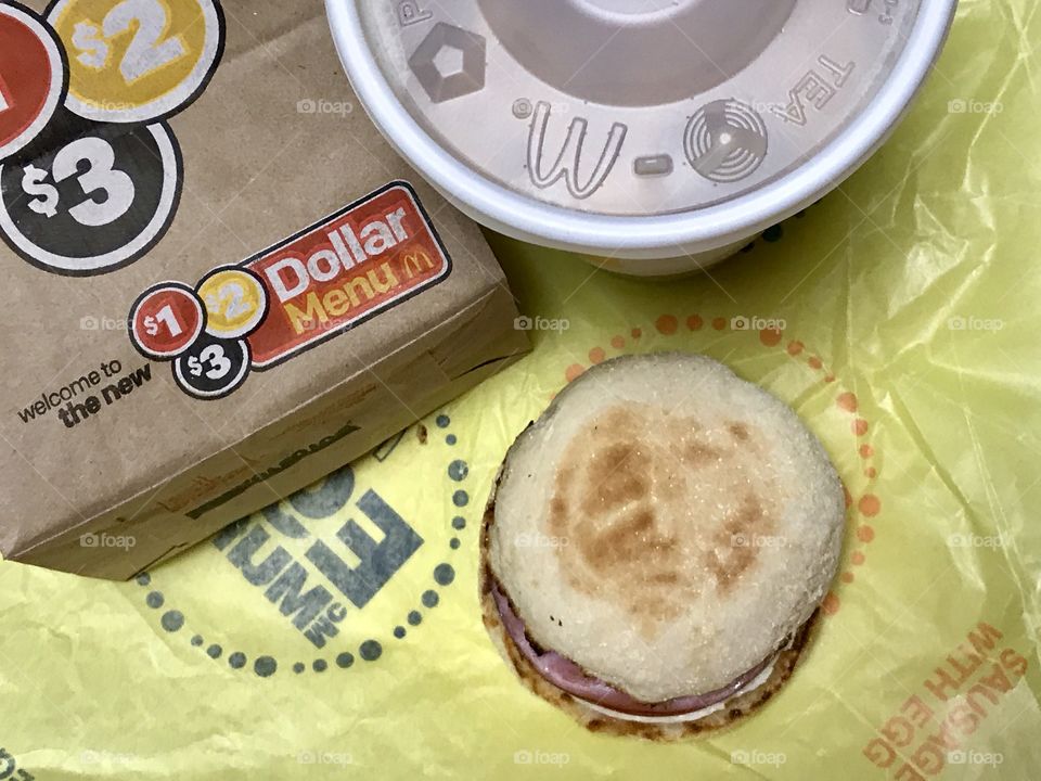 McDonald’s Egg McMuffin and a drink flat lay