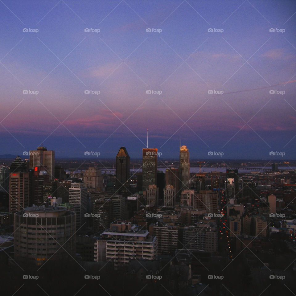 Montreal Canada skyline cityscape at sunset dusk overlooking city from Mont royale
