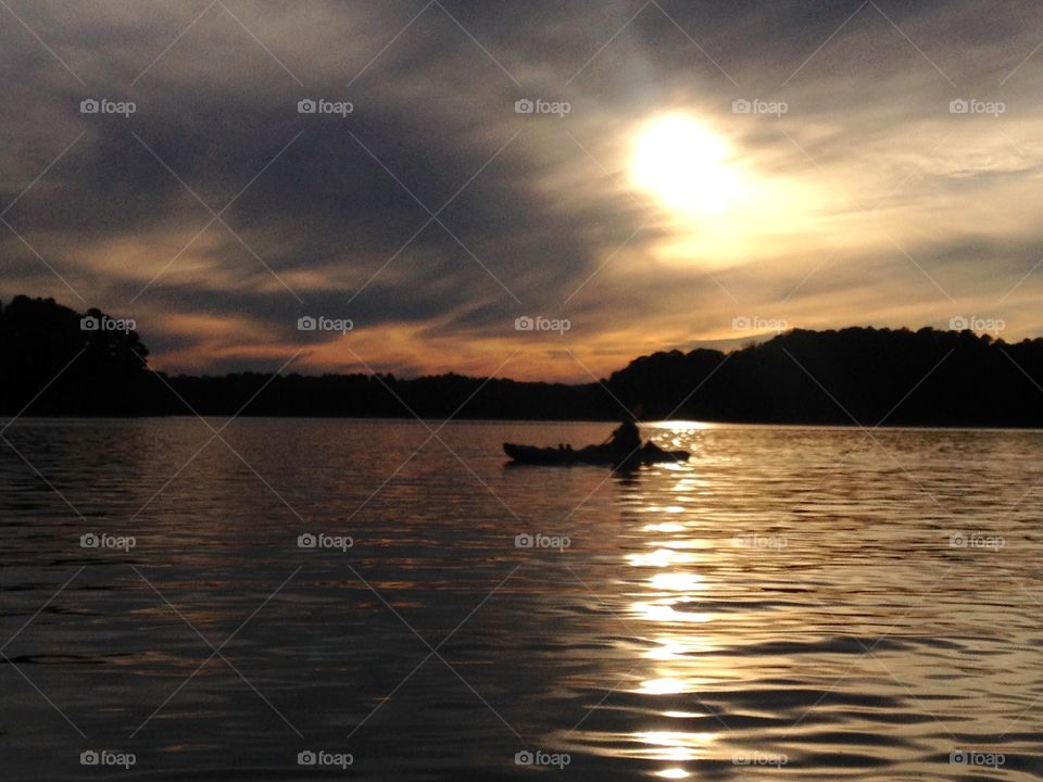 Viewing the settings sun. Last paddle of the day on Lake Hartwell 