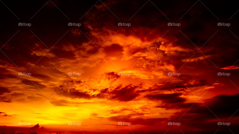 Low angel view of dramatic sky during sunset