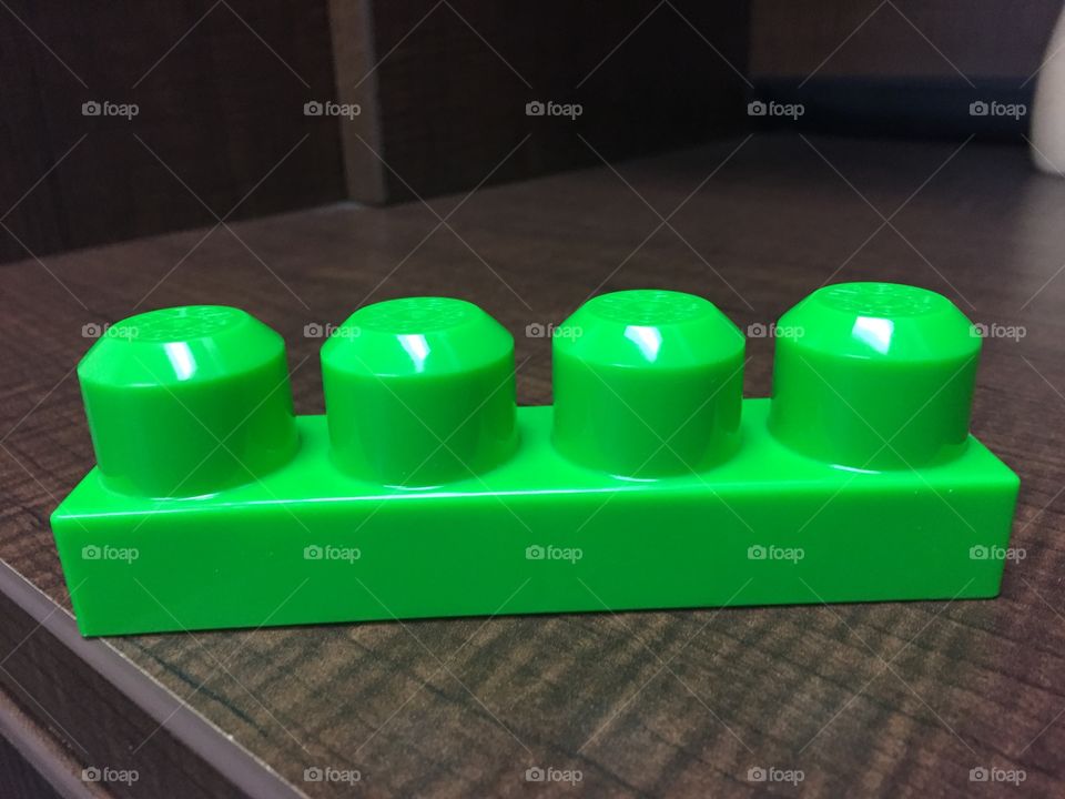 Green building toy block