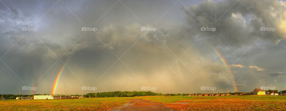 Full double rainbow after storm rolled through Perkins, Oklahoma farmland.
