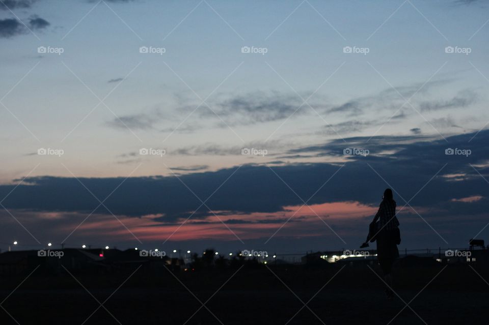 Dad and daughter are walking along the road
