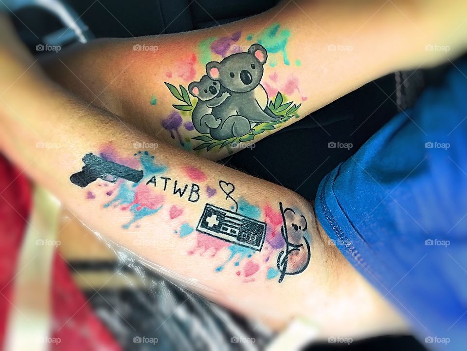 Mother and daughter tattoo