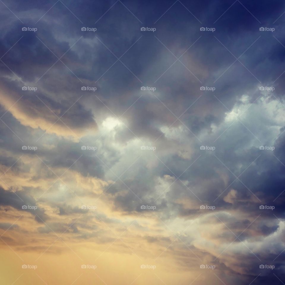 Storm rolling in sun and clouds 