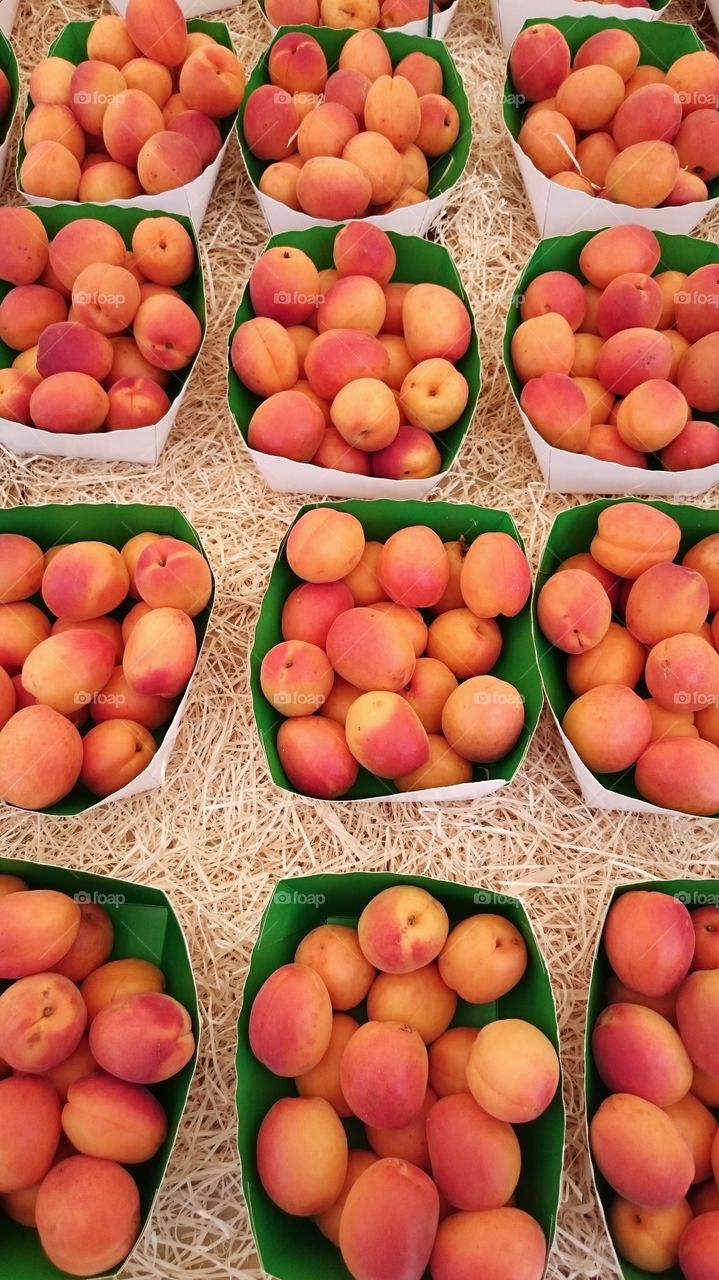 High angle view of peaches in box