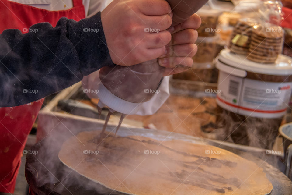 Chocolate crepes being made fresh; they are perfect for exploring a new city and they taste good too