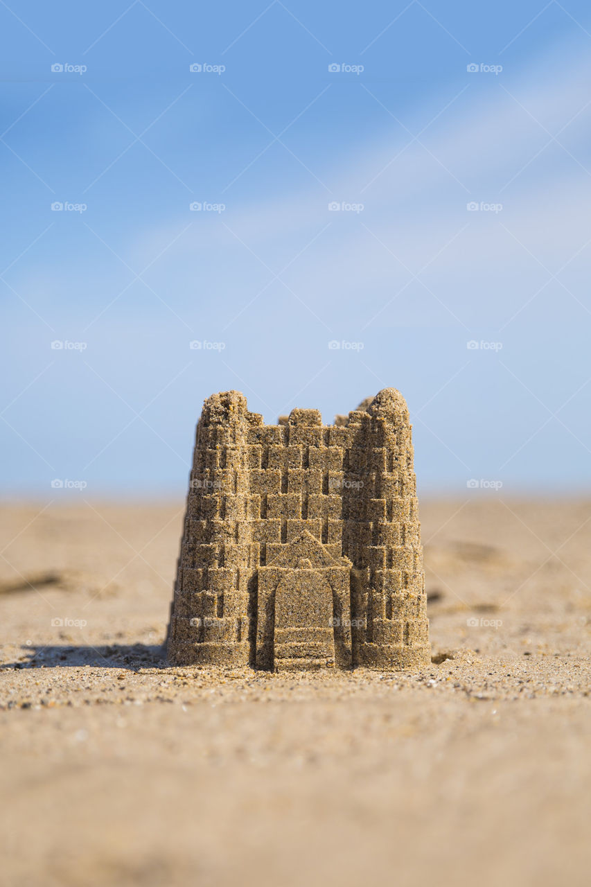 Sandcastle on beach