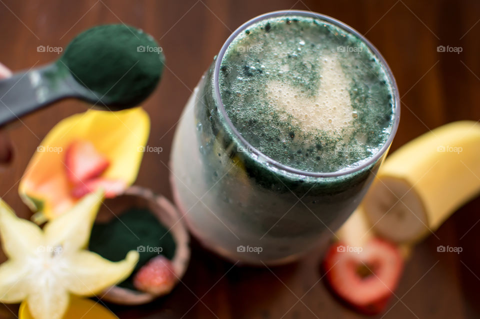 Healthy green smoothie with fruit
