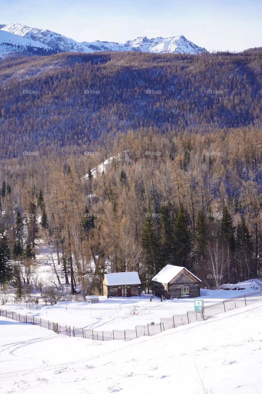 Villages under the snow-capped mountains