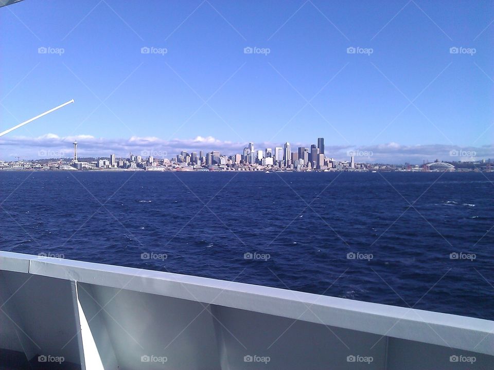 Seattle Skyline From Boat. Seattle skyline from a distance taken from a boat.