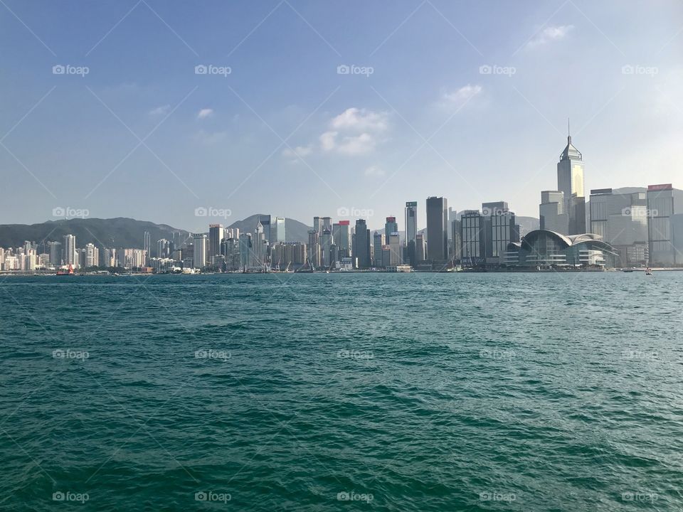 On a ferry to Hong Kong in a clear sunny day