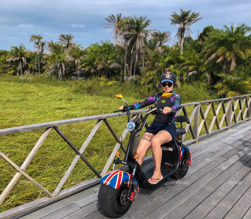 Mom riding a scooter for the first time