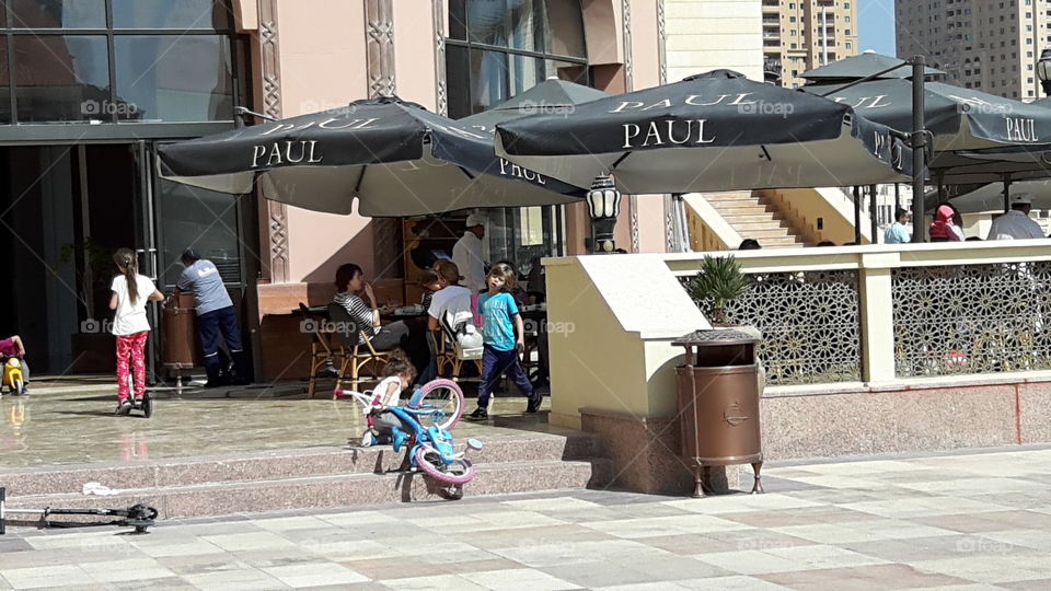 Restaurant by the street/ Children's enjoying the sunshine/ Beautiful sunshine day