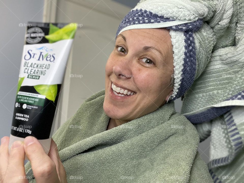 Woman takes care of her skin, skin care routine, focusing on the skin, facial routine, trying to look younger, woman’s face, skin on woman’s face, out of the shower, morning routines, daily routines