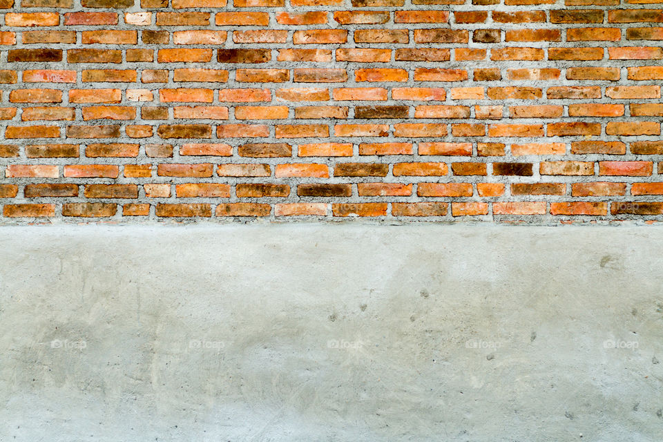 
Modern vintage loft style red brick and natural gray concrete wall texture background.