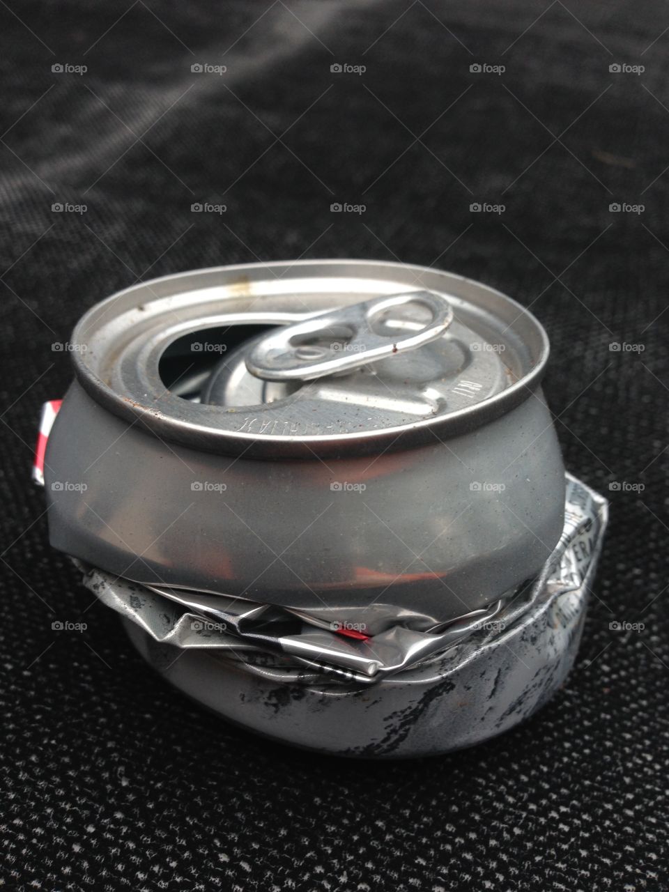 Blue mountain  crush. This cans was a Coors Light beer can, home of the blue mountains, was crushed to protection 