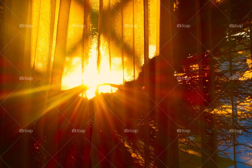 Sunrise through window on a cold day