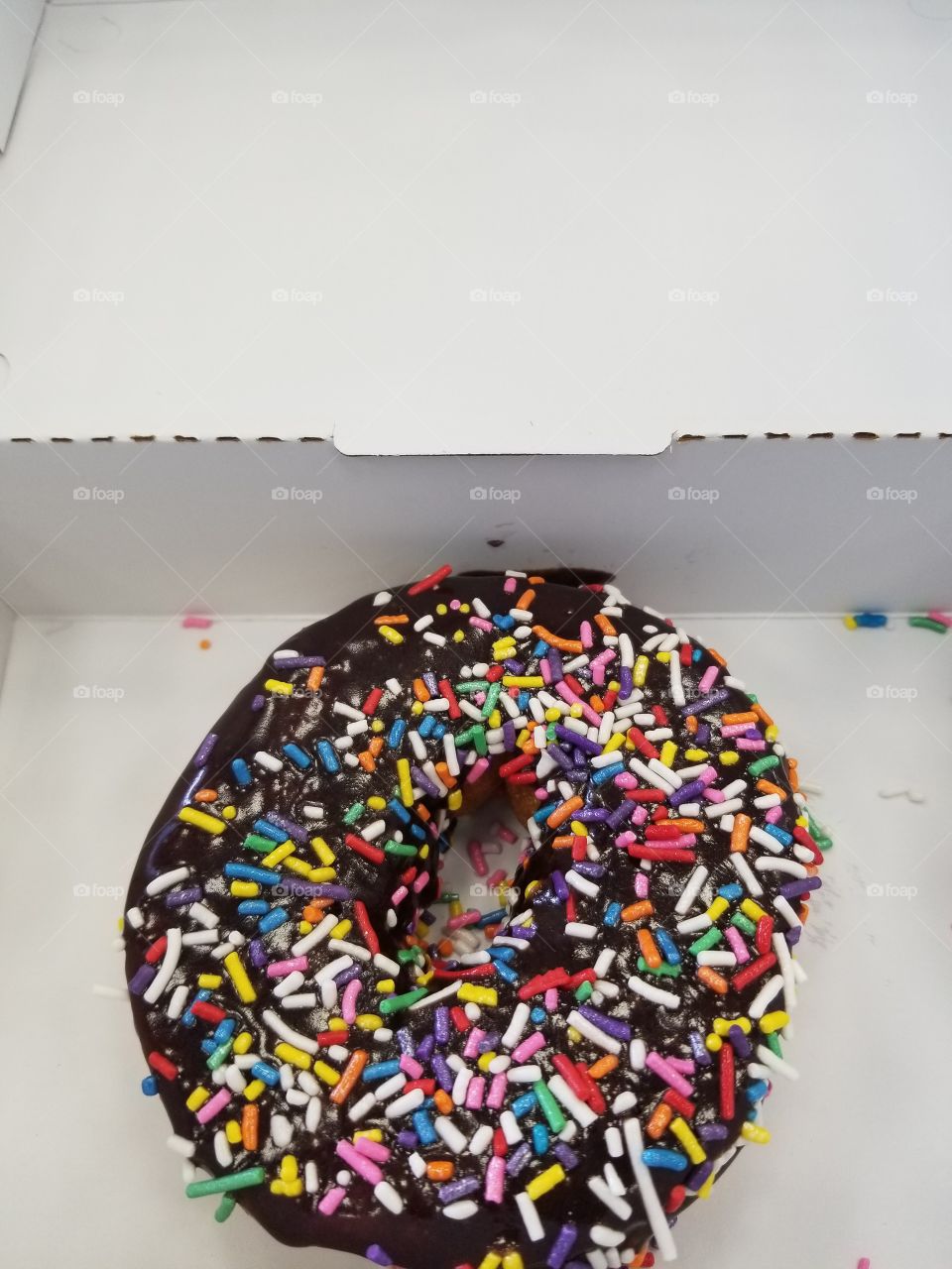 doughnut with rainbow sprinkles