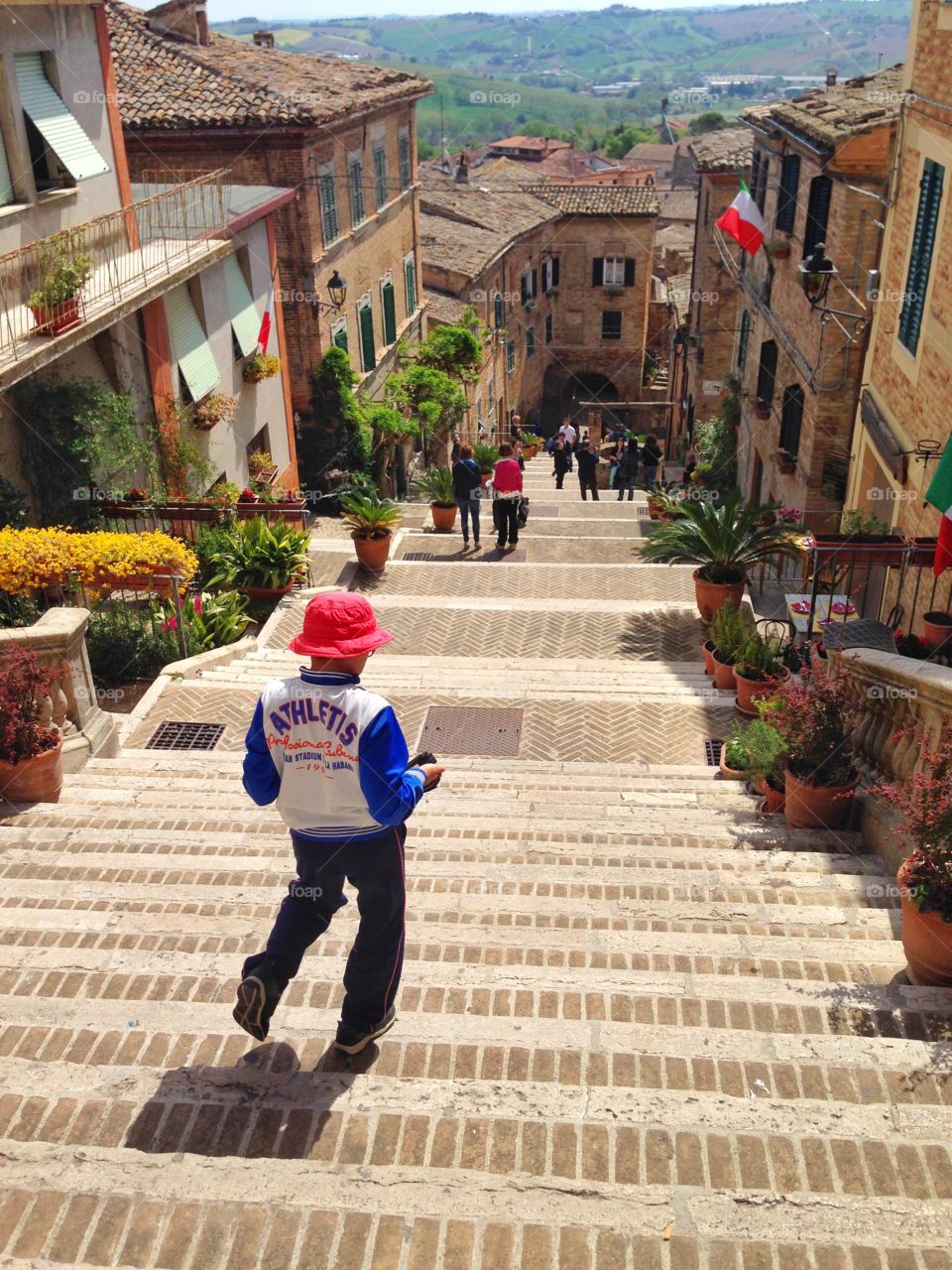 Boy run off from the steps. Boy run off from the steps