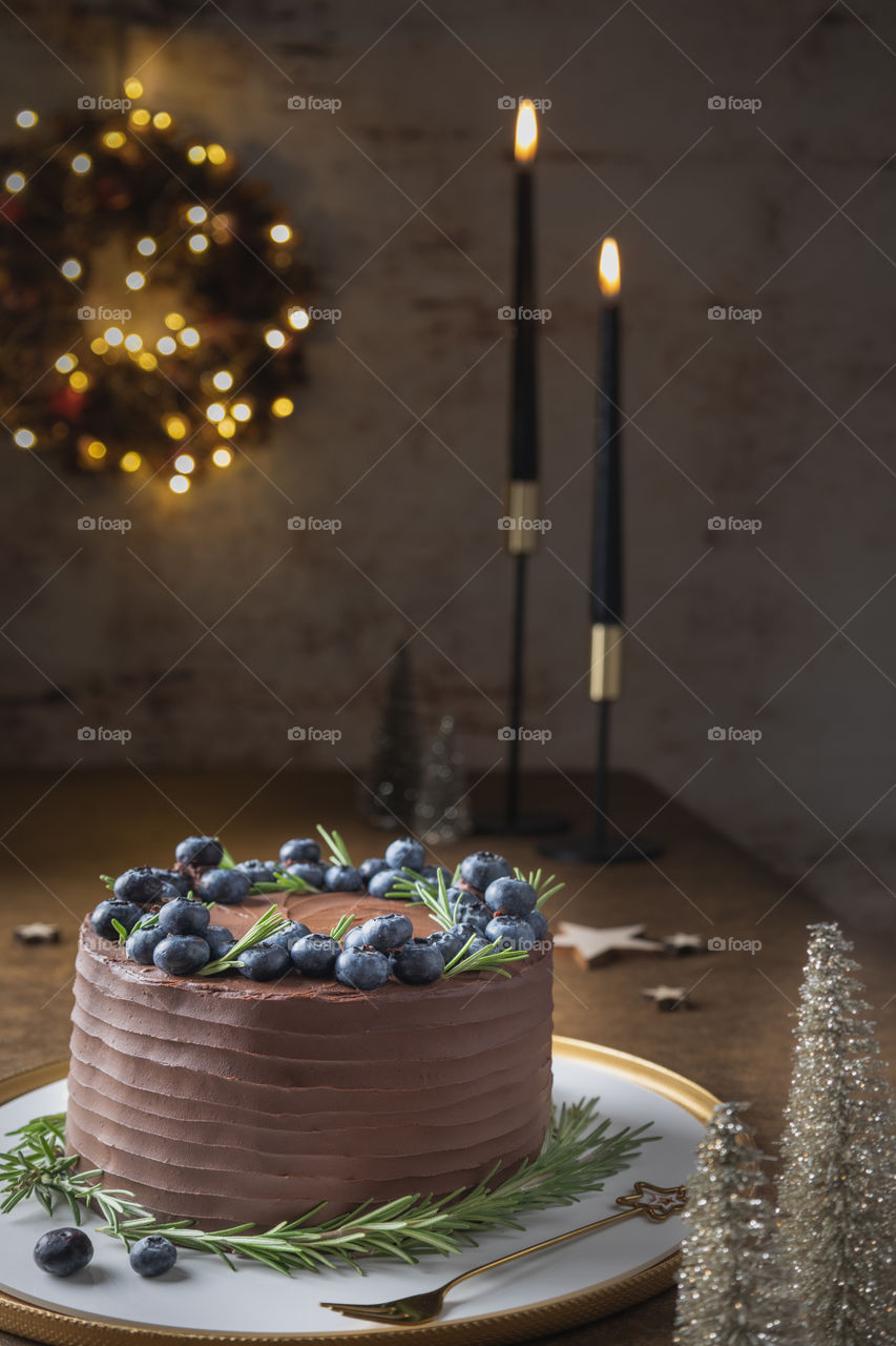 Chocolate cake and Christmas decorations 