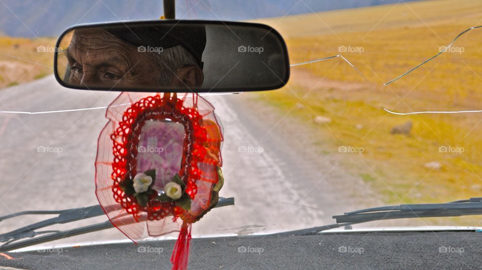 Driver in the back mirror