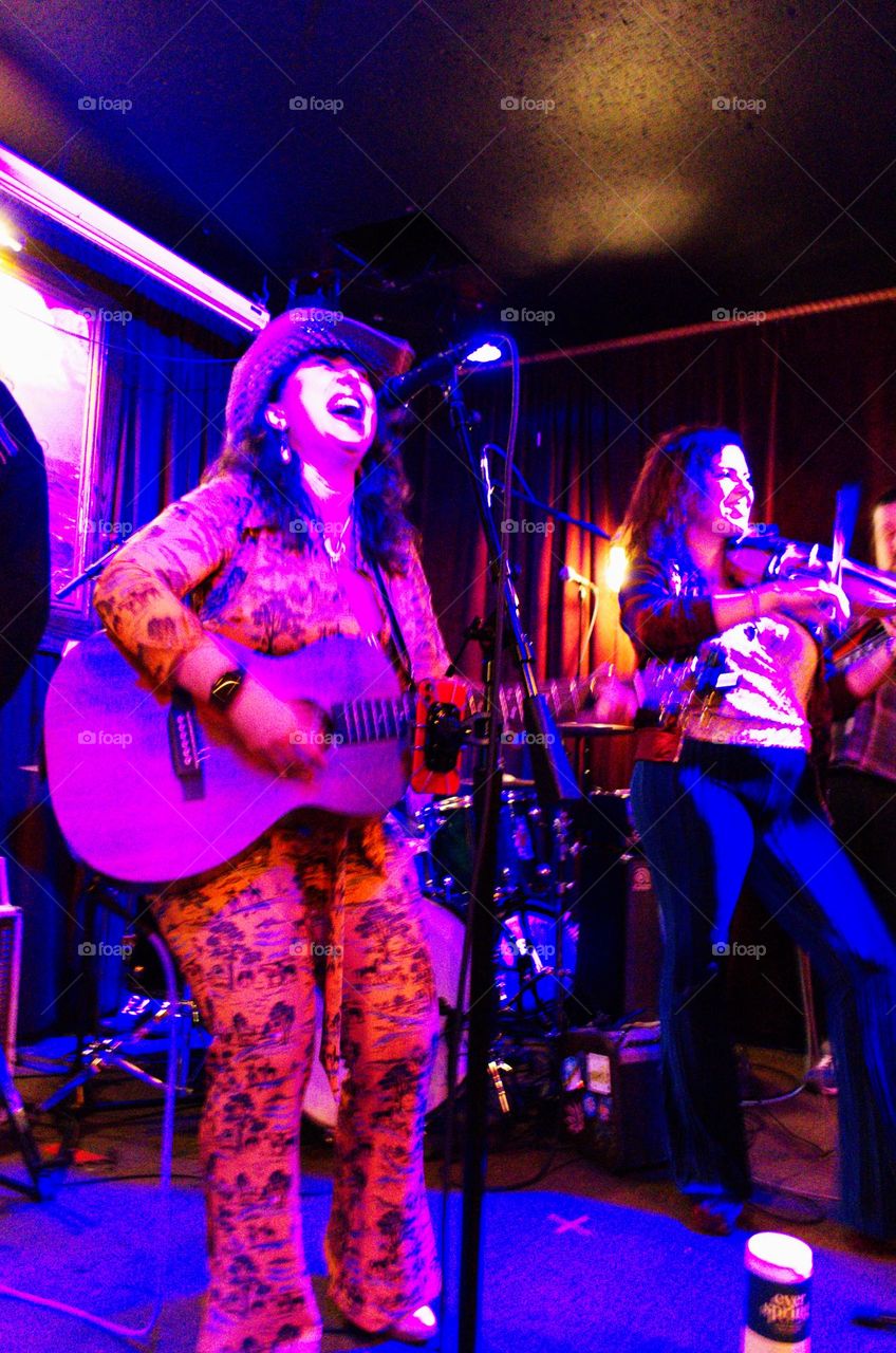 This is a band called Rah-Rah Rabbit, who I personally know. I didn’t do much editing to this one. This is what happens in dark bars with really saturating colored lights. It’s looks really cool, though.