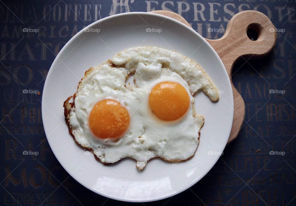 fried eggs from two yolks