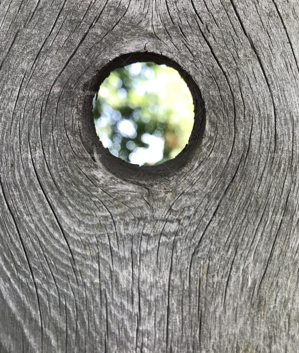 Hole through a board