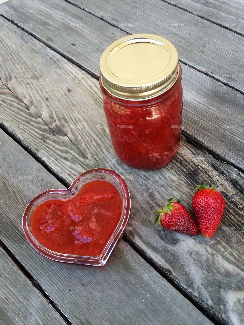 Overhead shot of strawberry jam on table