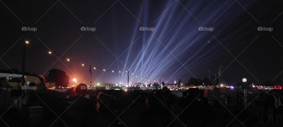 Festival mood. Night time scene lights, brightening the skies. Wacken Open Air