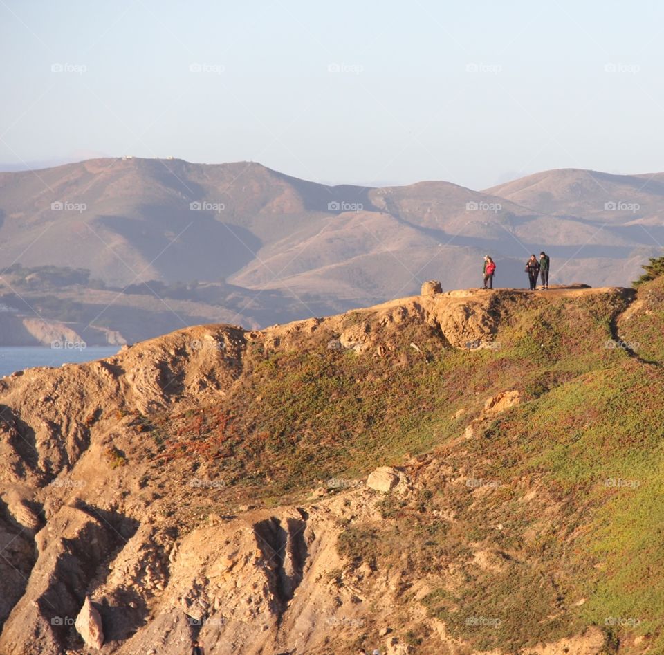 Mountain landscape with tourists 