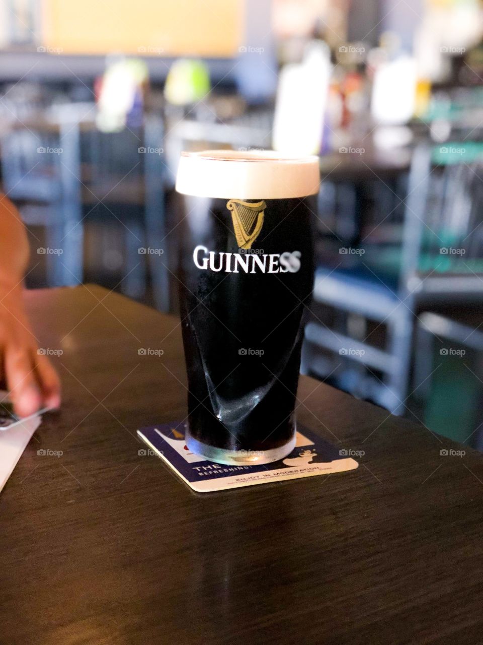 Enjoying Guinness at the pub