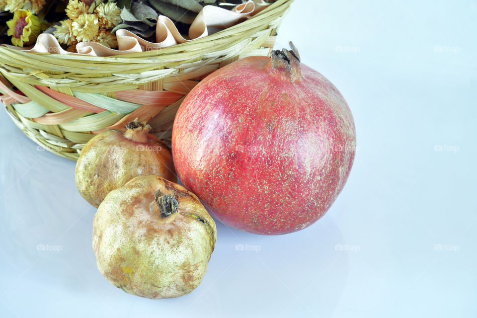 Pomegranates and basket