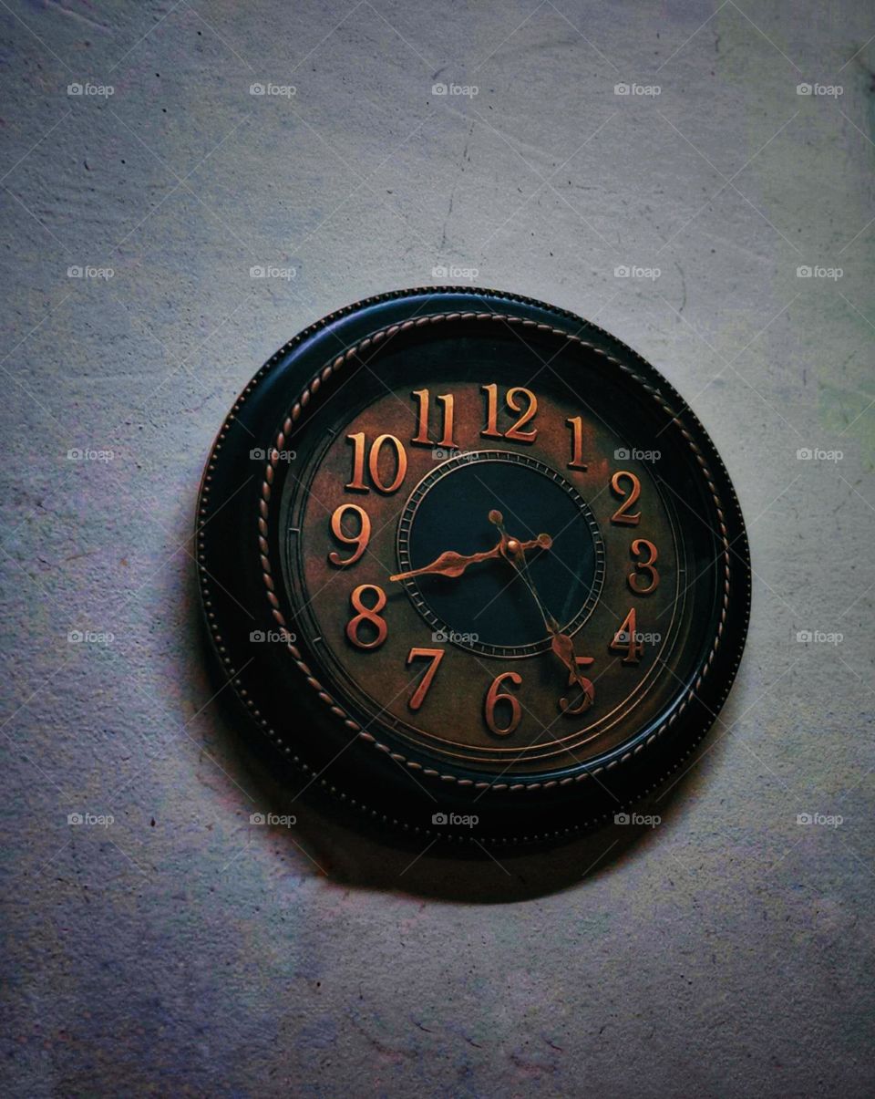 BROWN WALL CLOCK