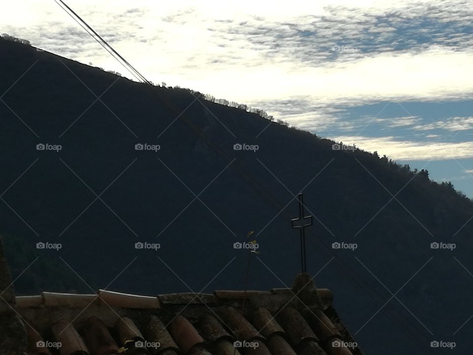 The sun under the clouds