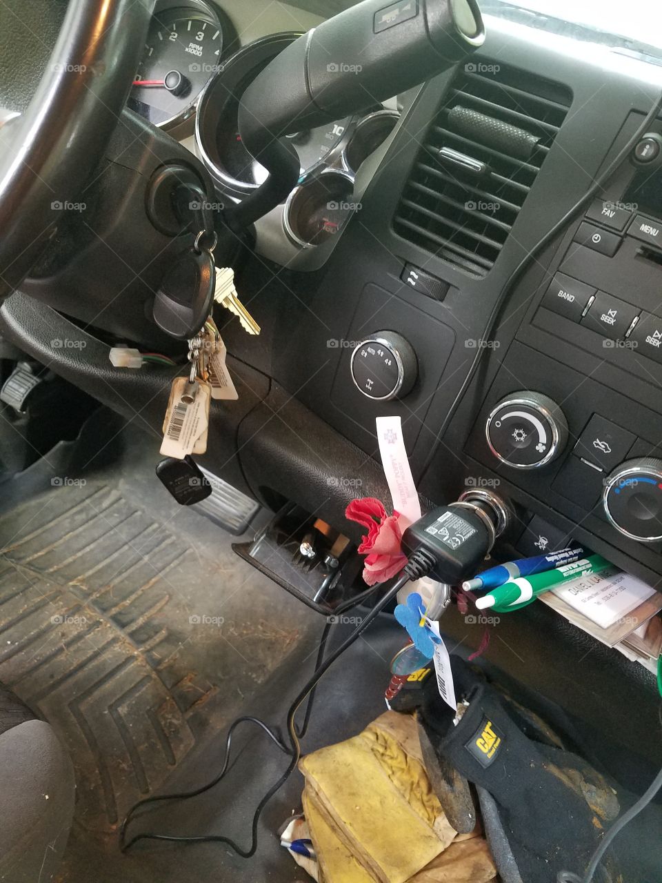 Work truck interior,  keychain in ignition.