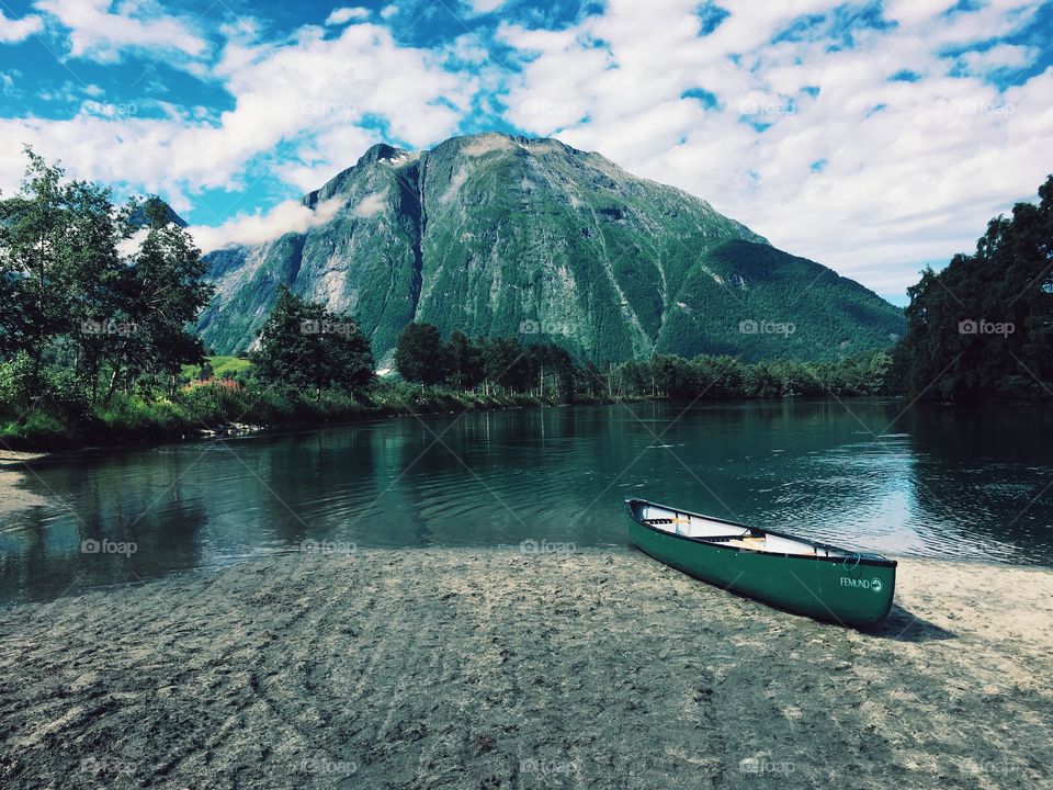 Boat moored at lake