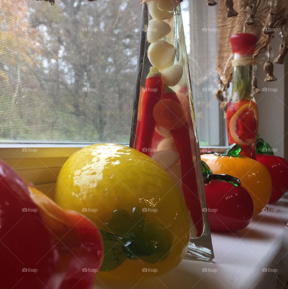 Kitchen window with art glass bright colorful vegetables 