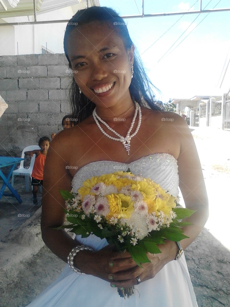 wedding attire, wedding flower bouquet, necklace, bracelet