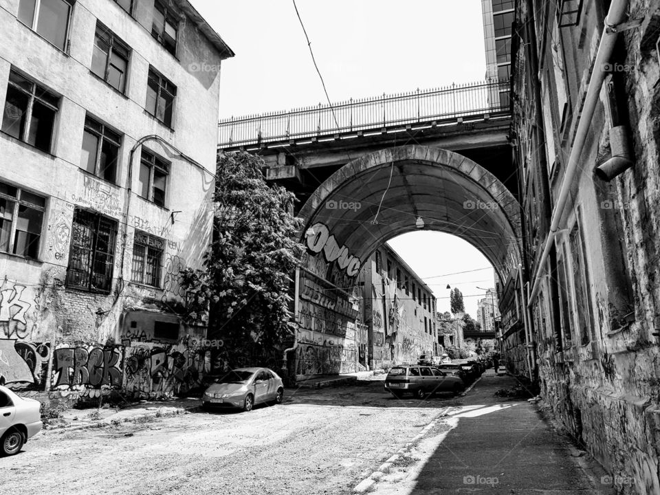 View under bridge on a street in decay