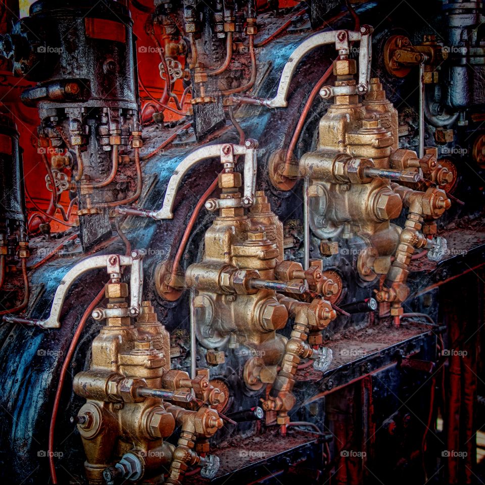 Tiled controls and other parts of a historic steam locomotive's engine cabin.