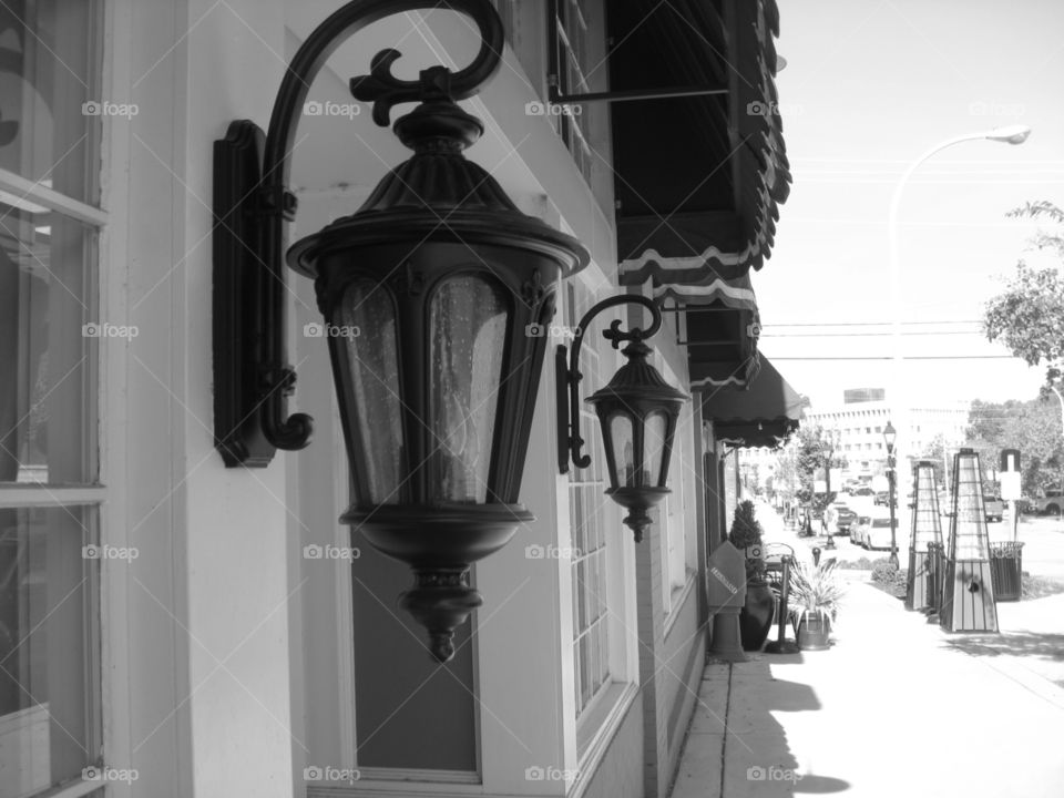 A vintage monochrome photo taken downtown Decatur. The light is heavy on the right side, but I believe it contrasts with the dark lamps on the left. 