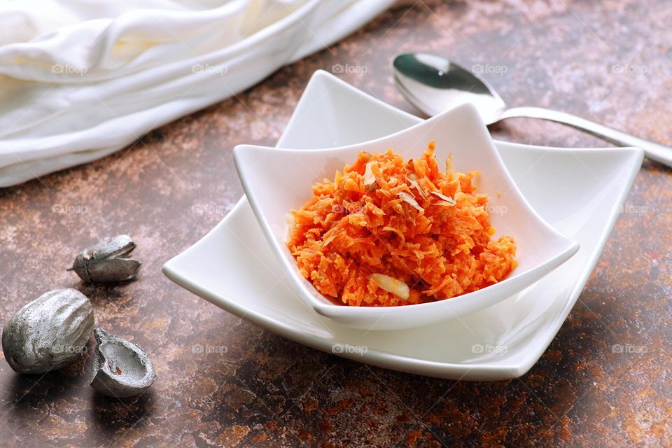 Indian dessert Gajar ka Halwa in a white bowl