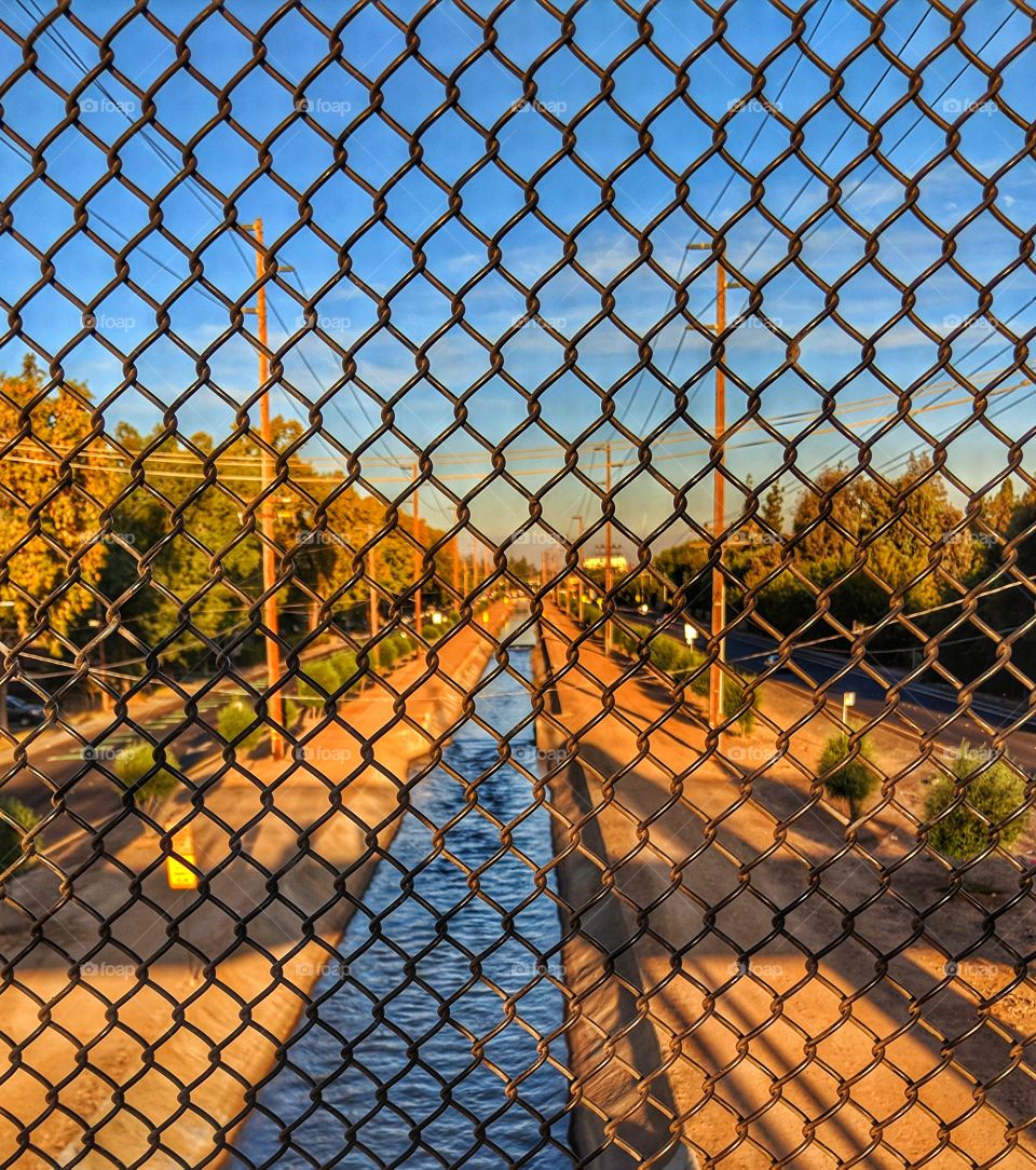 View of Water Canal and Street from a Foot Bridge