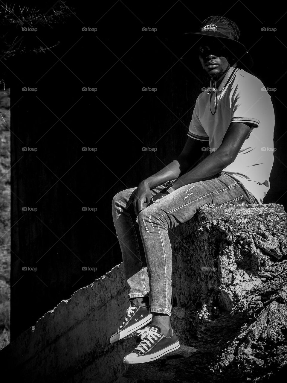 man sitting on the edge