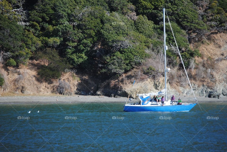 Recreational sailboaters taking a break